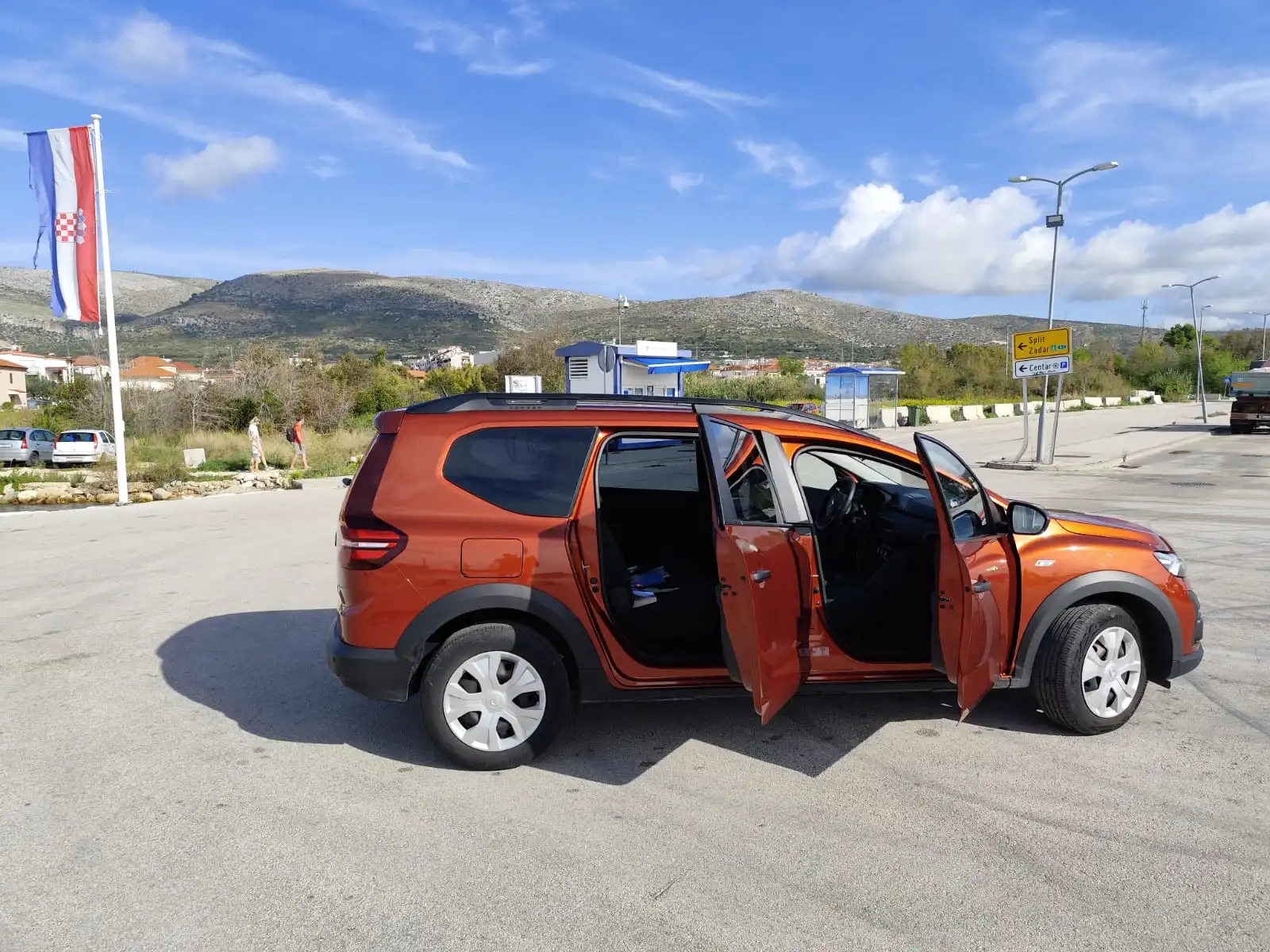 Eden taxi passenger vehicle with doors open